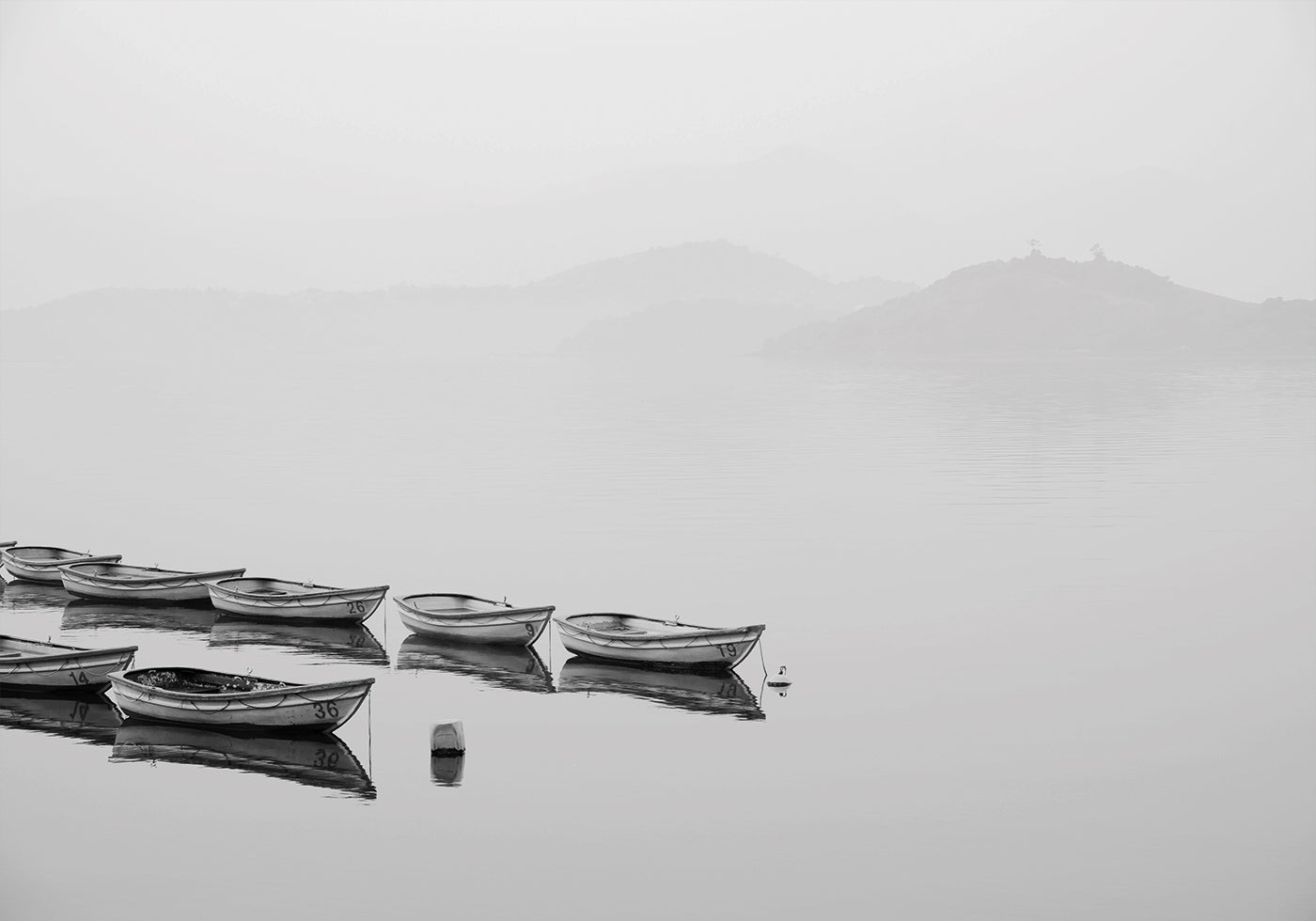 Boats In A Foggy Lake Poster