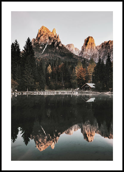 House At The Foot Of A Mountain Near A Lake Poster