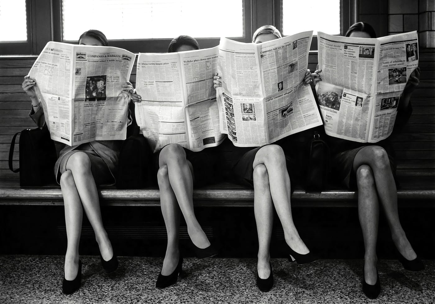 Women Reading Newspaper Poster