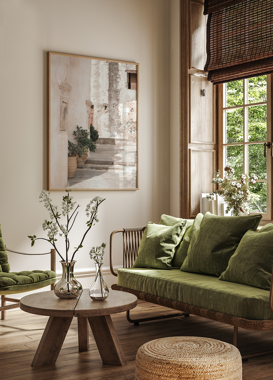 a living room filled with furniture and a painting on the wall