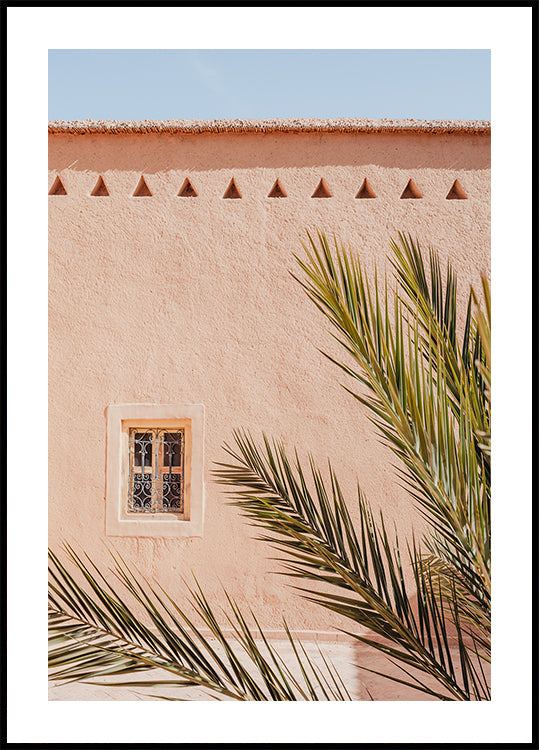 Palm leaves and a clay building in Morocco Poster