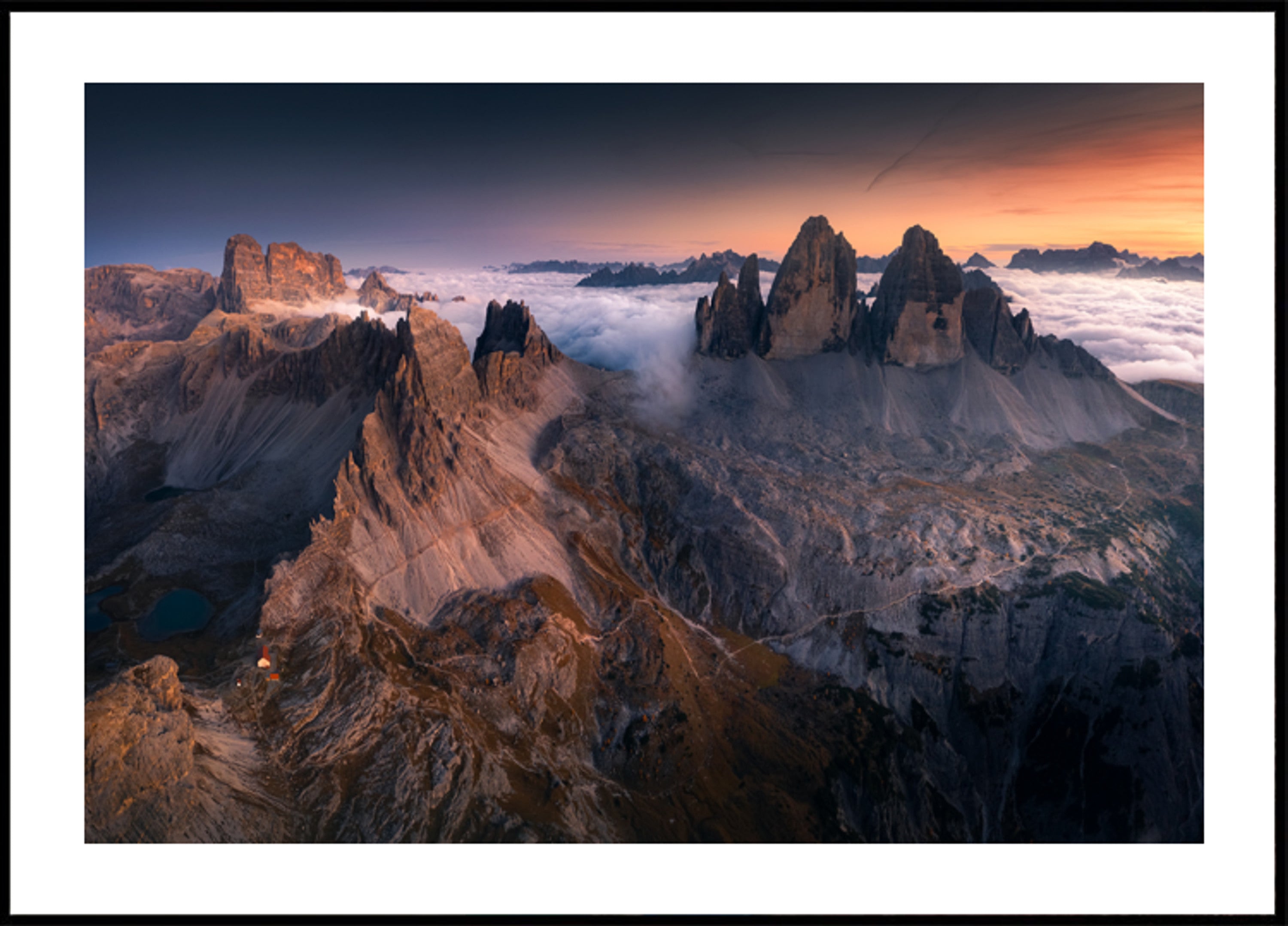 Majestic Peaks Above Clouds